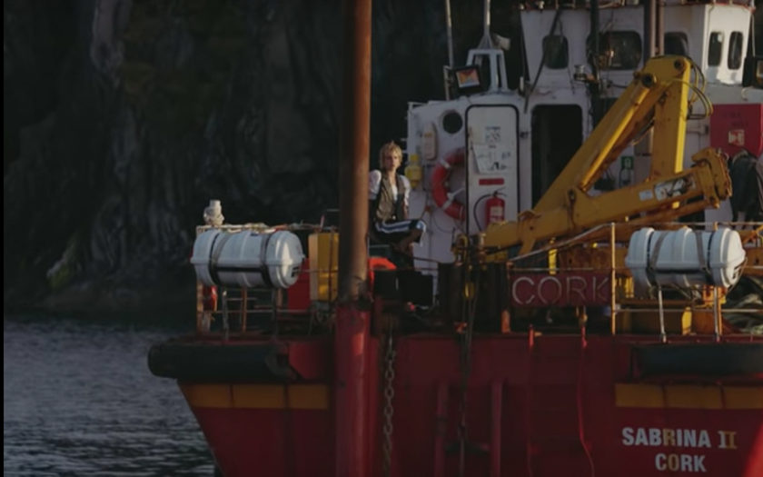 screenshot from sun in our eye music video of mo on a boat