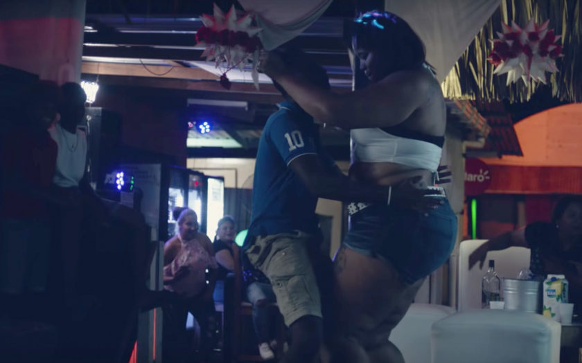 screenshot from i found you music video couple dancing in a bar