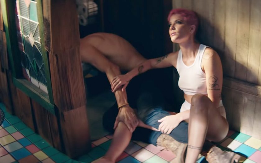 halsey holds her boyfriend while he vomits in the toilet after a rough night of drinking in without me music video