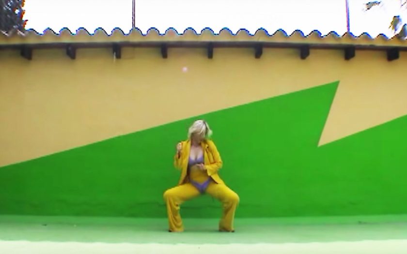 Robyn Wears Bikini over Pants in 'Between the Lines' music video